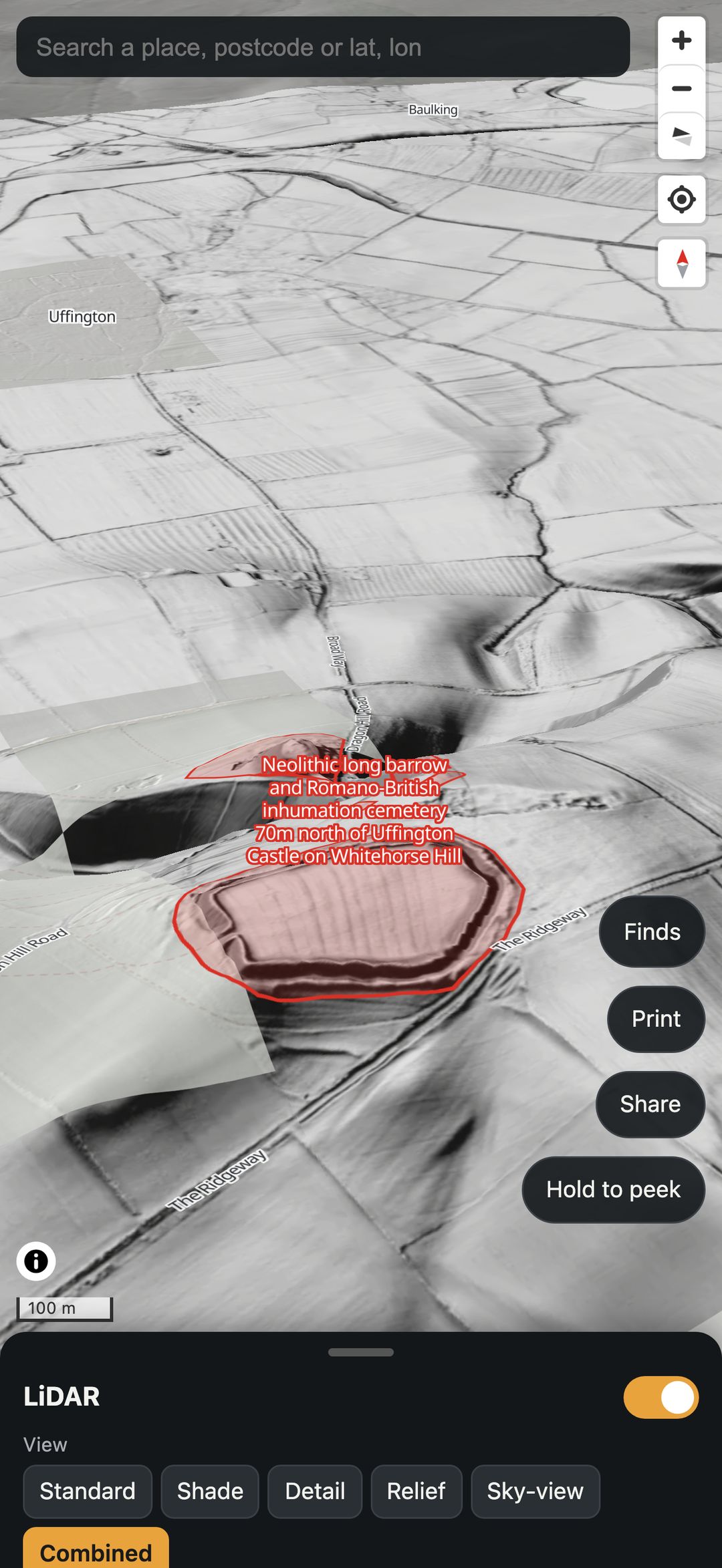The app tilted into 3D over Whitehorse Hill near Uffington Castle, with a Scheduled Monument outlined in red.