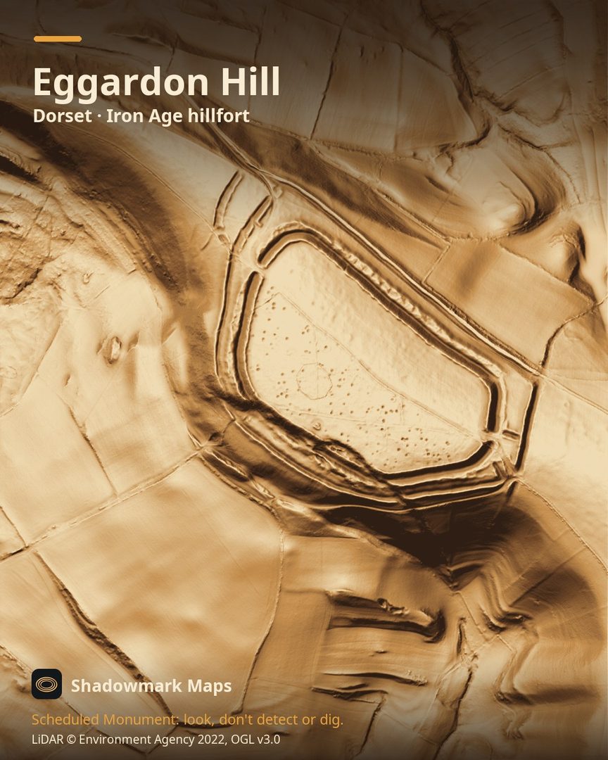 LiDAR terrain shading of Eggardon Hill, Dorset. Look for three ramparts with ditches between, complex staggered entrances on the north-west and east, an octagonal bank inside, and the interior pitted with small round hollows.
